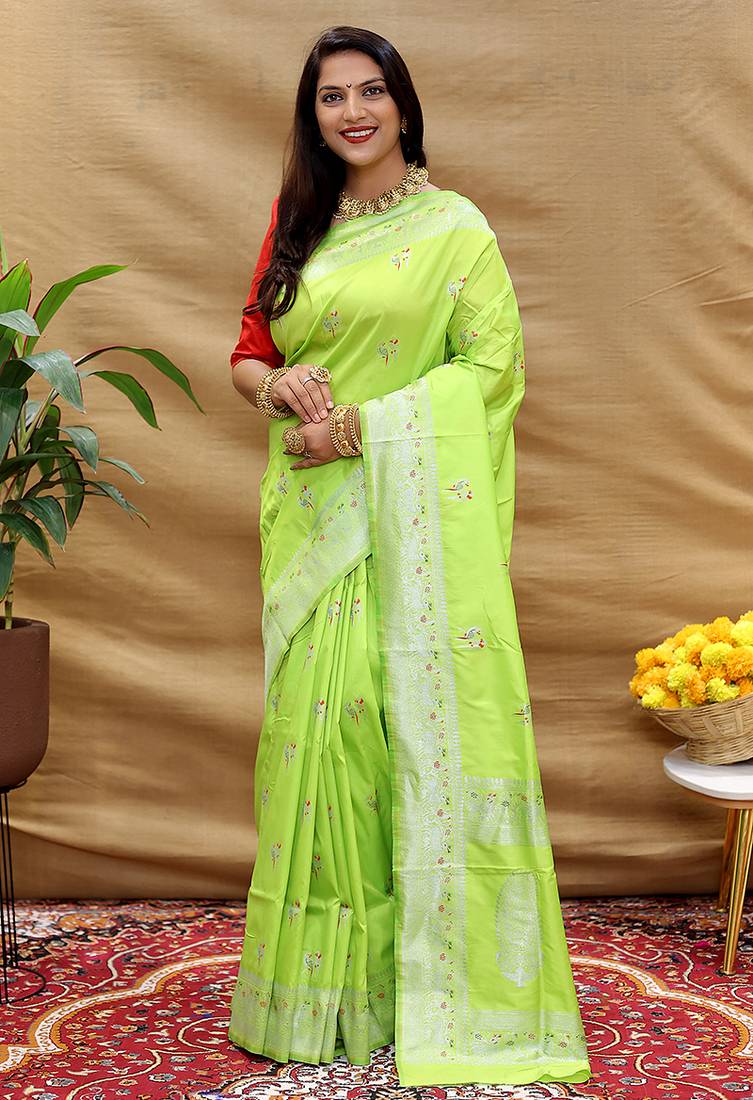Lime green silk blend banarasi saree with silver zari border and peacock pallu