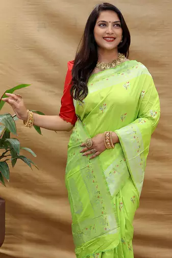 Lime green silk blend banarasi saree with silver zari border and peacock pallu