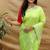 Lime green silk blend banarasi saree with silver zari border and peacock pallu