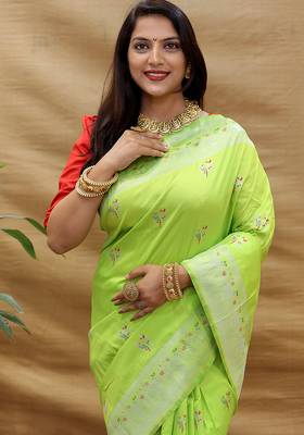 Lime green silk blend banarasi saree with silver zari border and peacock pallu 4