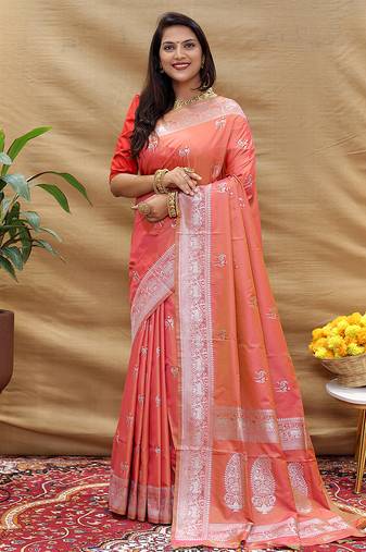 Peach silk blend banarasi saree with silver zari border and peacock pallu