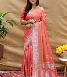 Peach silk blend banarasi saree with silver zari border and peacock pallu