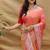 Peach silk blend banarasi saree with silver zari border and peacock pallu