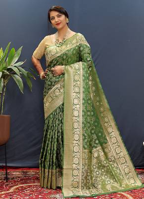 Dark green silk blend banarasi saree with all-over gold zari jaal work 1