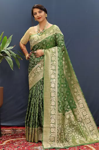 Dark green silk blend banarasi saree with all-over gold zari jaal work