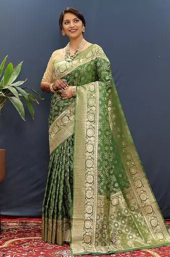 Dark green silk blend banarasi saree with all-over gold zari jaal work