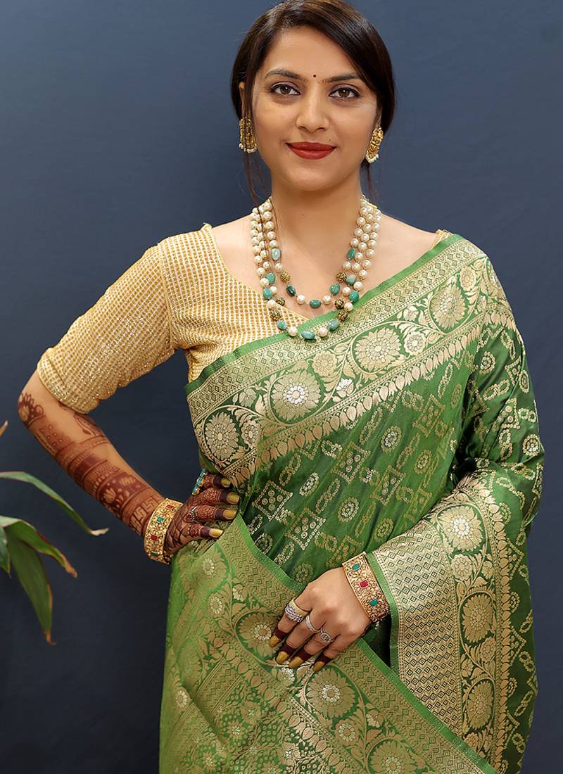 Dark green silk blend banarasi saree with all-over gold zari jaal work
