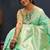 Mint green silk blend banarasi saree with all-over gold zari jaal work