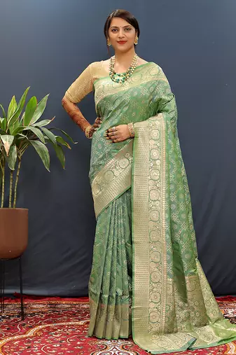 Olive green silk blend banarasi saree with all-over gold zari jaal work