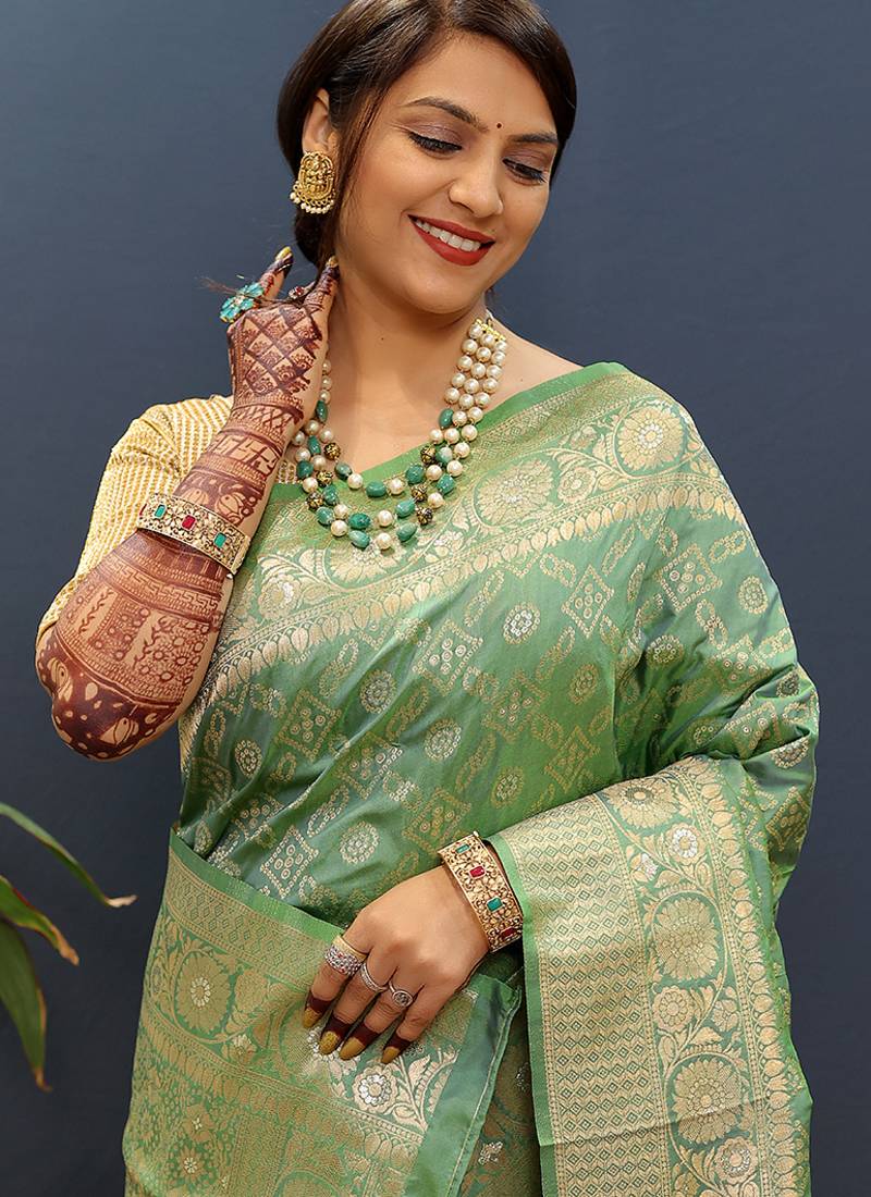 Olive green silk blend banarasi saree with all-over gold zari jaal work