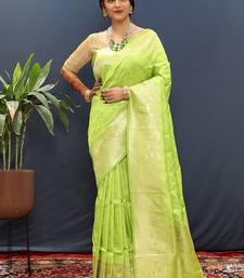 Lime green silk blend banarasi saree with all-over gold zari jaal work