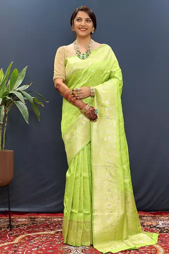 Lime green silk blend banarasi saree with all-over gold zari jaal work