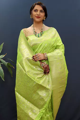 Lime green silk blend banarasi saree with all-over gold zari jaal work