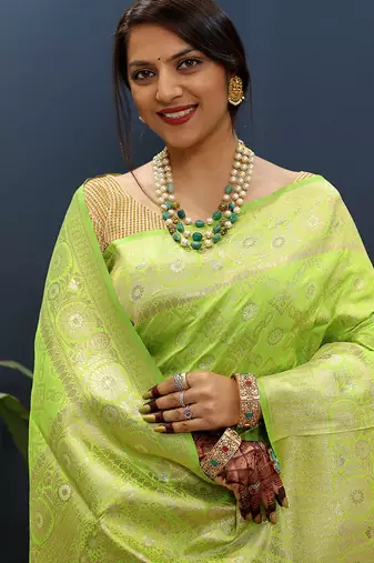 Lime green silk blend banarasi saree with all-over gold zari jaal work