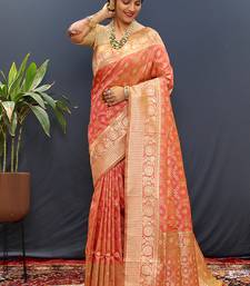 Red silk blend banarasi saree with all-over gold zari jaal work