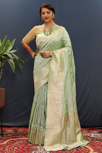 Mint green silk blend banarasi saree with all-over gold zari jaal work
