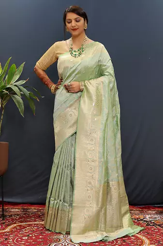 Mint green silk blend banarasi saree with all-over gold zari jaal work