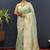 Mint green silk blend banarasi saree with all-over gold zari jaal work
