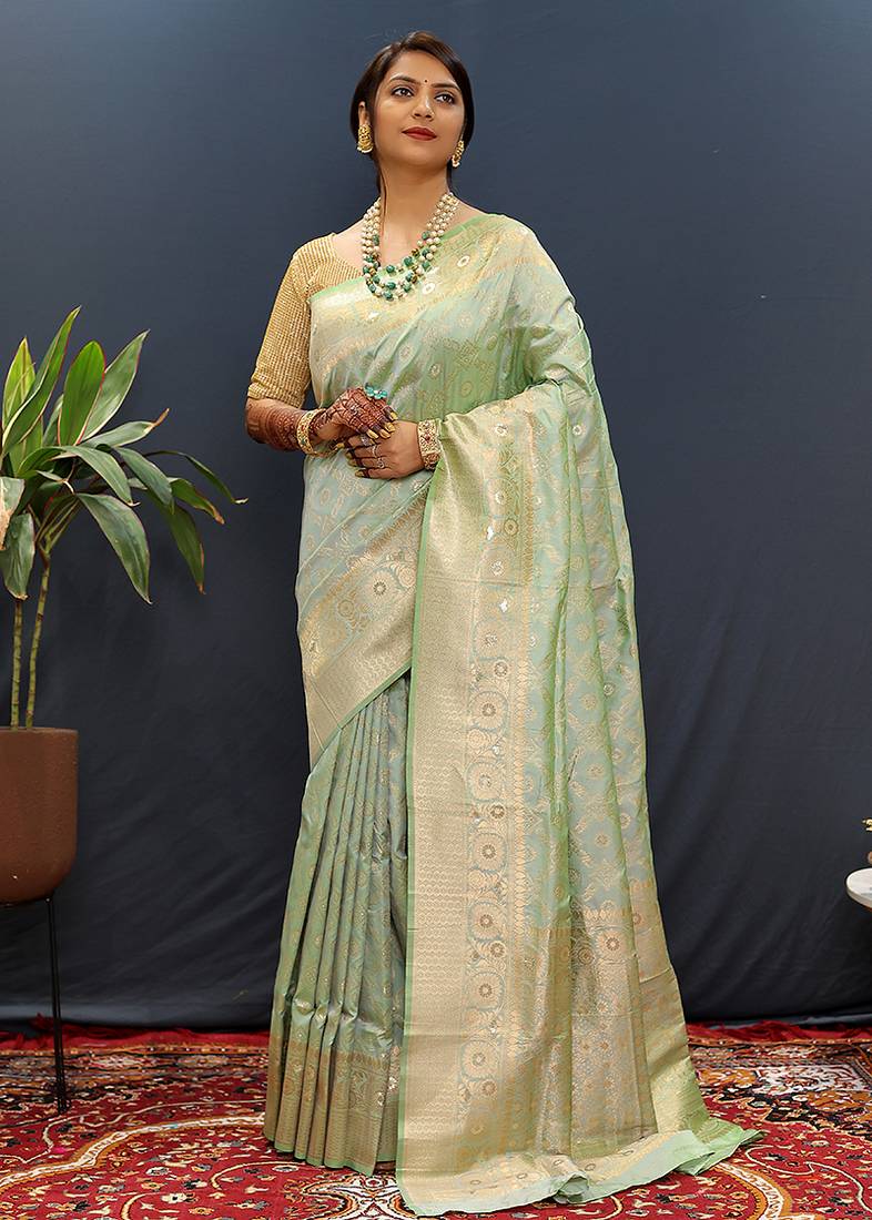 Mint green silk blend banarasi saree with all-over gold zari jaal work