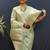 Mint green silk blend banarasi saree with all-over gold zari jaal work