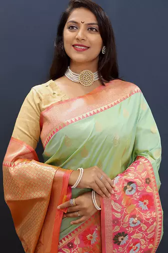 Mint green banarasi silk blend saree with multicolor paithani floral border & pallu