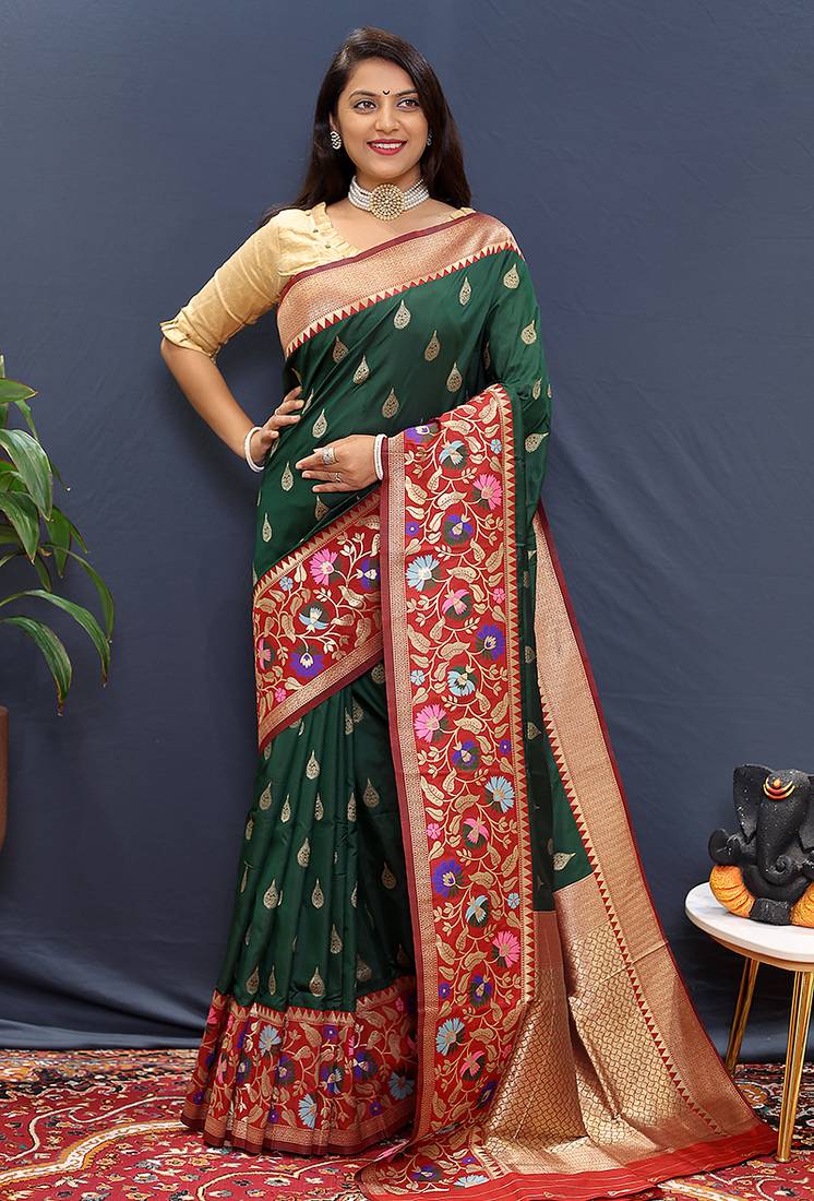 Bottle green banarasi silk blend saree with multicolor paithani floral border & pallu
