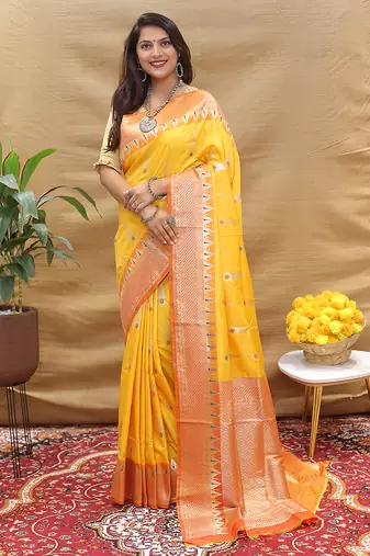 Mustard yellow banarasi silk blend saree with orange zari woven border