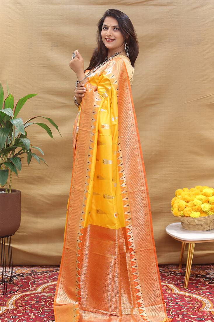 Mustard yellow banarasi silk blend saree with orange zari woven border