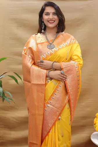 Mustard yellow banarasi silk blend saree with orange zari woven border