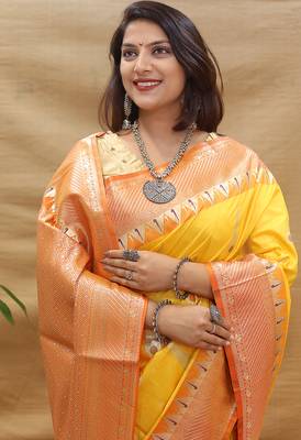 Mustard yellow banarasi silk blend saree with orange zari woven border 4