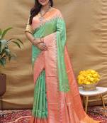 Mint green banarasi silk blend saree with peach zari woven border