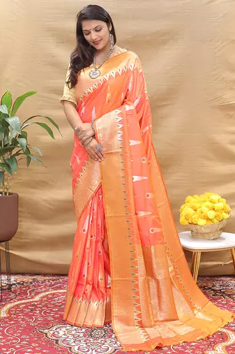 Peach banarasi silk blend saree with orange zari woven border