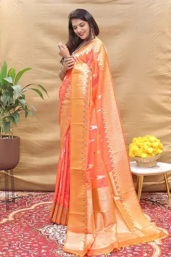 Peach banarasi silk blend saree with orange zari woven border