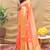 Peach banarasi silk blend saree with orange zari woven border