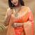 Peach banarasi silk blend saree with orange zari woven border