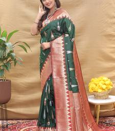 Dark green banarasi silk blend saree with maroon zari woven border