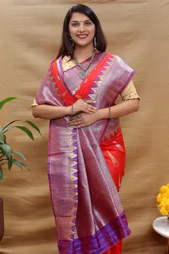 Red banarasi silk blend saree with purple zari woven border