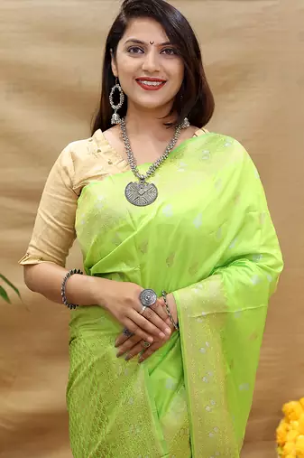 Lime green banarasi silk blend saree with silver zari weaving