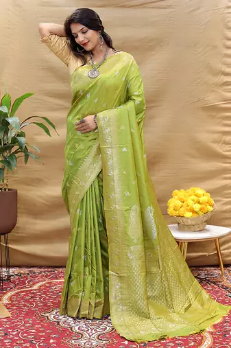 Light olive green banarasi silk blend saree with silver zari weaving