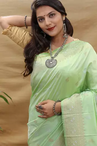 Mint green banarasi silk blend saree with silver zari weaving