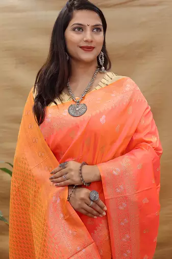 Coral orange banarasi silk blend saree with silver zari weaving