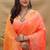 Coral orange banarasi silk blend saree with silver zari weaving