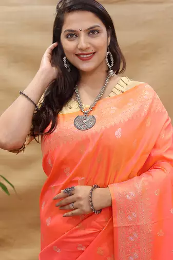 Coral orange banarasi silk blend saree with silver zari weaving