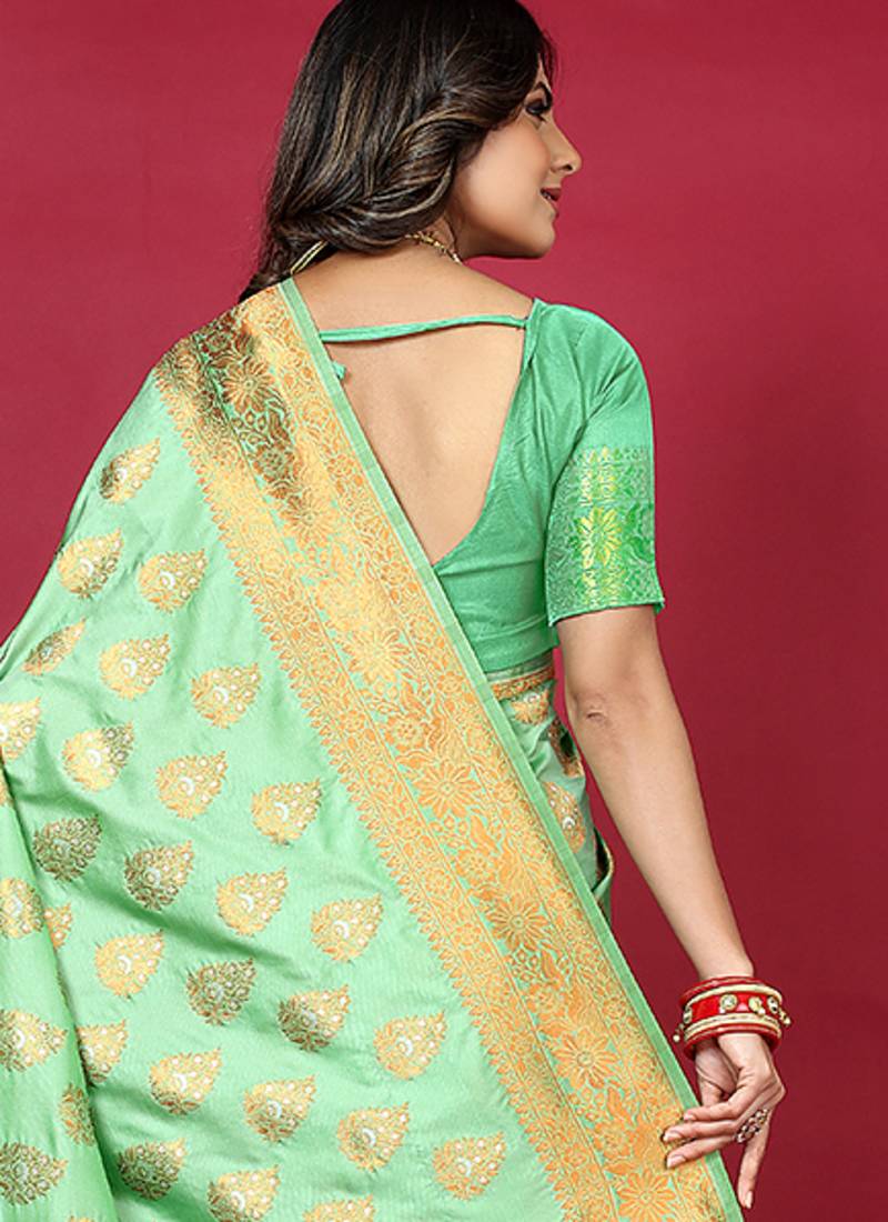 Mint green banarasi silk blend saree with copper zari weave