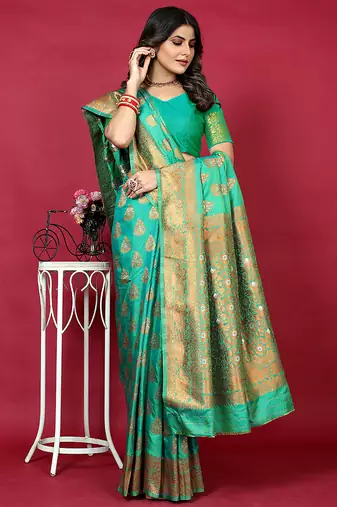 Emerald green banarasi silk blend saree with copper zari weave