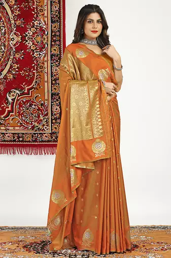 Rust banarasi silk blend saree with zari buta weaving