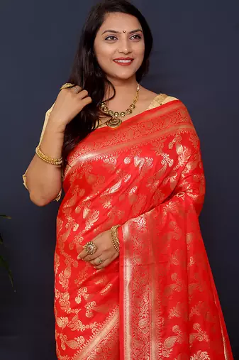 Red kanjeevaram silk blend saree with copper zari floral weaving