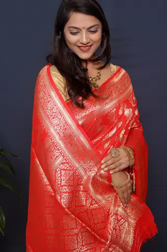 Red kanjeevaram silk blend saree with copper zari floral weaving