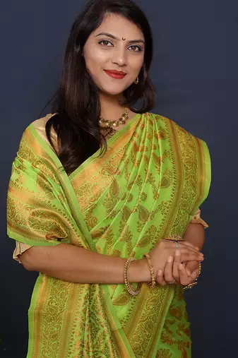 Lime green kanjeevaram silk blend saree with copper zari floral weaving