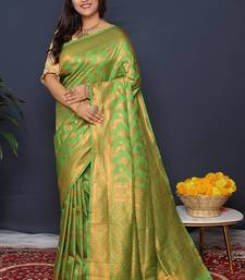 Leaf green kanjeevaram silk blend saree with copper zari floral weaving